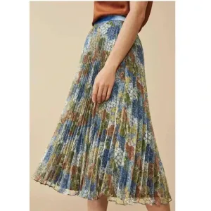 The Fold pleated blue colorful midi skirt. Size UK 10 which is about a 6 in US.