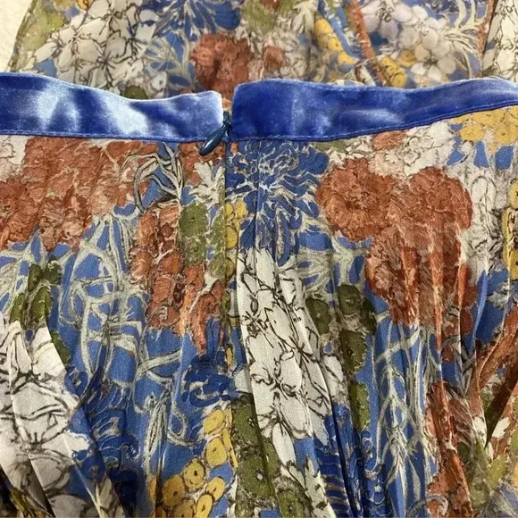 The Fold pleated blue colorful midi skirt. Size UK 10 which is about a 6 in US.