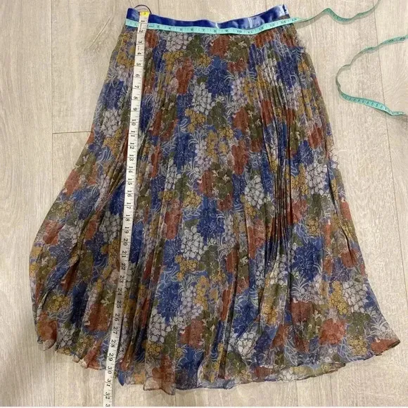 The Fold pleated blue colorful midi skirt. Size UK 10 which is about a 6 in US.